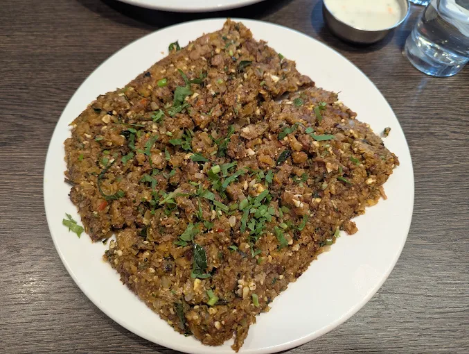 Egg Kothu Paratha at Olive South Indian Cuisine Calgary